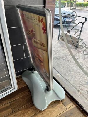 a picture of a sign in front of a window