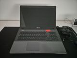 a laptop computer sitting on top of a desk
