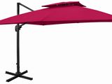une image représentant un parapluie rouge posé sur un support noir