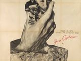 une vieille affiche de cinéma représentant une femme tenant un enfant dans ses bras