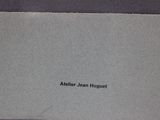 a close up of a piece of paper with a black writing on it