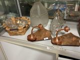 a glass display case with a lot of glass items on it