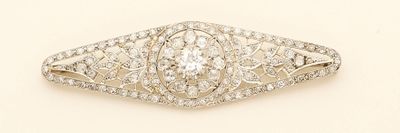 a close up of a diamond ring on a white background