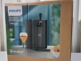 emballage d'un distributeur de bière Philips posé sur une table