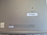 a laptop that has a label on the back of it