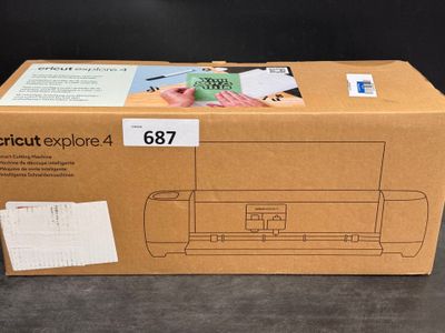 une boîte sur laquelle figure l'image d'une imprimante