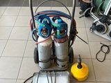 une image représentant un chariot sur lequel sont posés deux cylindres