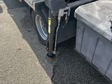 a truck that is parked on the side of the road