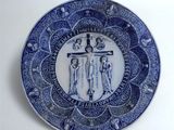an image of a blue and white plate with a cross on it