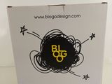 the box is white and has a black and yellow logo on it