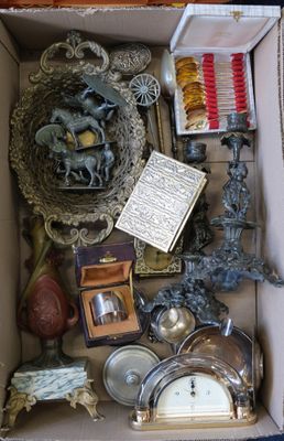 a box full of assorted items sitting on the floor