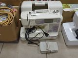 many different types of sewing machines on the floor