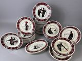 several plates with different designs are stacked on top of each other