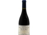 a bottle of wine that is sitting on a table