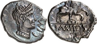 a silver coin with an image of a woman and a man on it