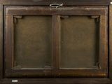 an old wooden cabinet with a glass door on it