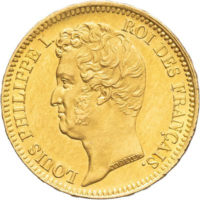 gros plan d'une pièce d'or avec un visage de femme