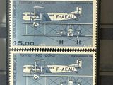 two stamps with a picture of a plane and a plane on them