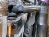 a box full of vacuums and other household items in it