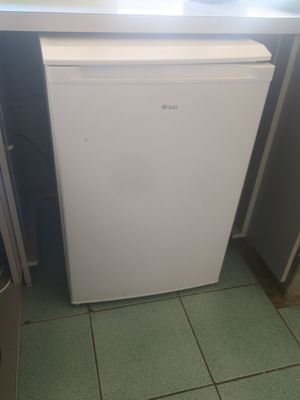 an image of a white refrigerator in a kitchen