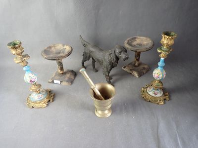 a lot of antique items that are sitting on a table