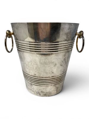 a large silver metal bucket with two handles on a white background