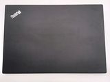 an image of a black mouse pad on a white surface