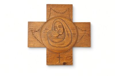 an image of a wooden cross with an image of jesus and mary on it