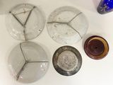four plates that have been left on the table