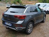 a car that is parked in a lot with other cars