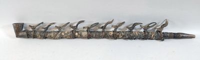 a metal object that has a bunch of birds on it