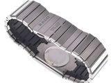 a watch that is sitting on top of a metal bracelet