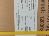 the back of a cardboard box with a yellow ribbon on it