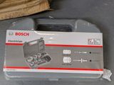 a box of bosch electrician tools sitting on the floor