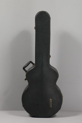 a guitar case that is sitting on a table