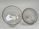 a glass bowl with a glass lid and a glass bowl with a glass lid