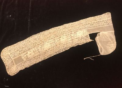an image of a piece of lace on a black background