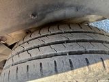 a close up view of a tire on a vehicle