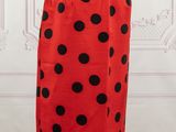a red and black polka dot skirt on a mannequin mannequin mannequin mannequin mannequin mannequin mannequin manne