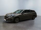 the grey toyota sienna is parked in a large room