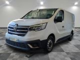 the white van is parked on a checkered floor in a room