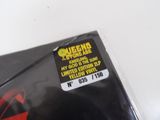 a picture of a sticker on the back of a skateboard
