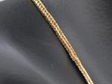a gold chain necklace on a mannequin mannequin mannequin mannequin mannequin mannequin mannequin mannequin manne