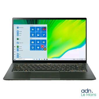 a laptop computer with a green screen and windows on the screen