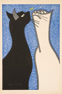 un chat noir et blanc et un chat blanc qui se regardent