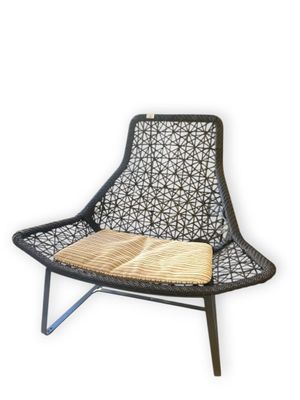 an image of a chair with a cushion on top of it