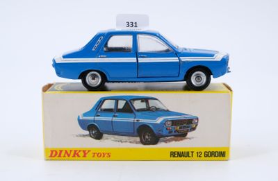 a blue toy car sitting on top of a box