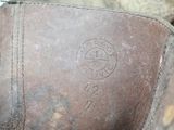 a close up view of a brown leather shoe