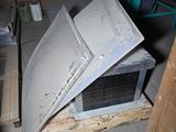 a refrigerator that is sitting on top of a pallet