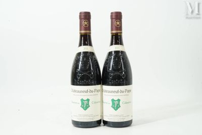 two bottles of wine sitting next to each other on a white surface